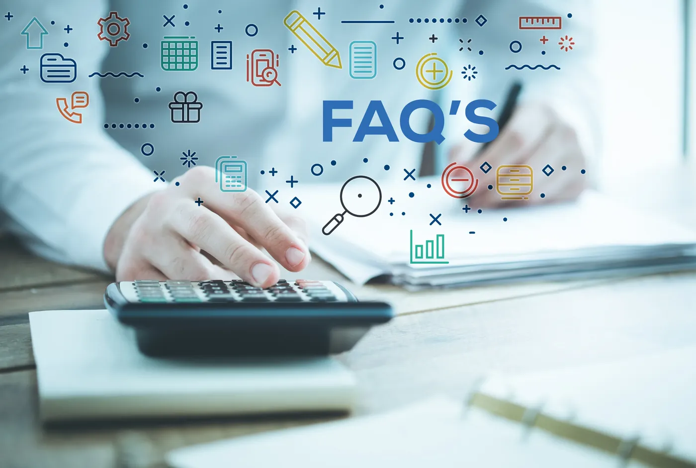 A person at a desk with illustrated icons representing frequently asked questions